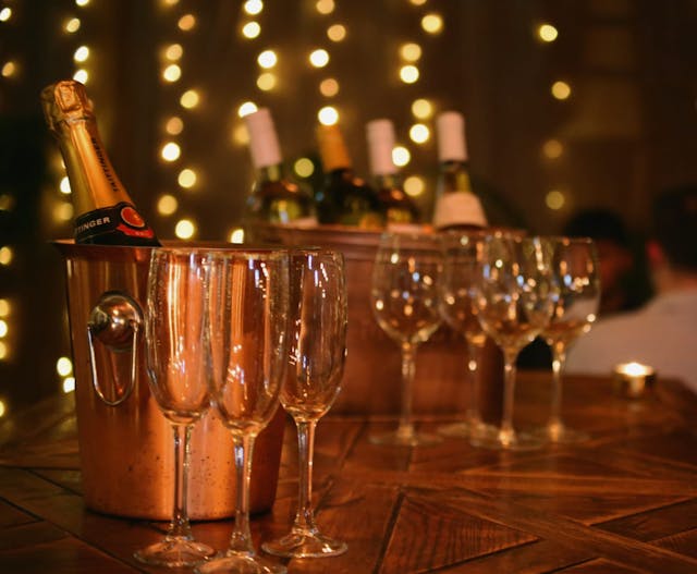 Champagne bucket with empty flutes